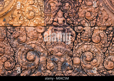 Bas-relief of Indra riding the three-head elephant Airavata on a pediment of Banteay Srei; Angkor, Siem Reap, Cambodia Stock Photo