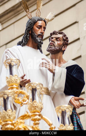 Float of Christ of the brotherhood of 'El Beso de Judas' during its penitential journey on Holy Monday. Stock Photo