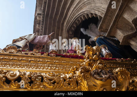 Float of Christ of the brotherhood of 'San Esteban' leaving in procession of its church on Holy Tuesday. Stock Photo