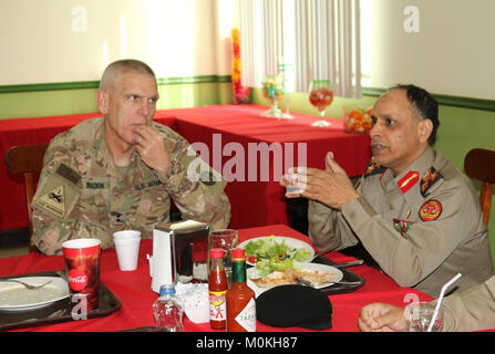 The 35th Infantry Division hosts a luncheon at the Oasis dining facility with the Kuwait Armed Forces Military Justice Authority Jan. 17. The legal teams met to discuss legal cooperation between the two countries and building a lasting partnership for the future. Maj. Gen. Victor Braden & Brig. Gen. Mubarak Al Khurainij discussed matters of legal cooperation. (U.S. Army Stock Photo