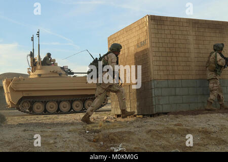 1st Cavalry Division Troopers maneuver through the team building ...
