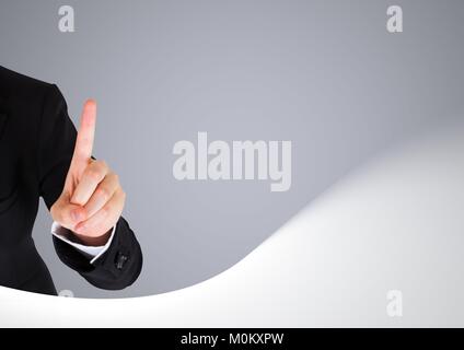 Hand pointing with grey  background Stock Photo