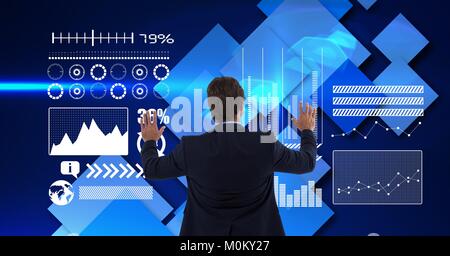 Man touching interface on wall Stock Photo