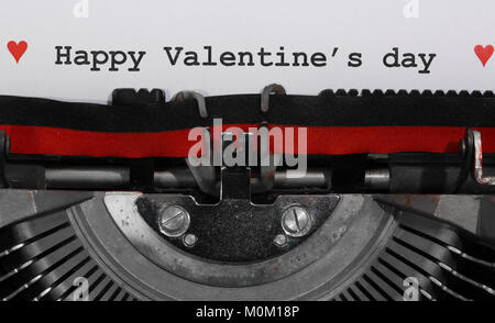 Text Happy Valentine's day  written with the typewriter on white sheet Stock Photo