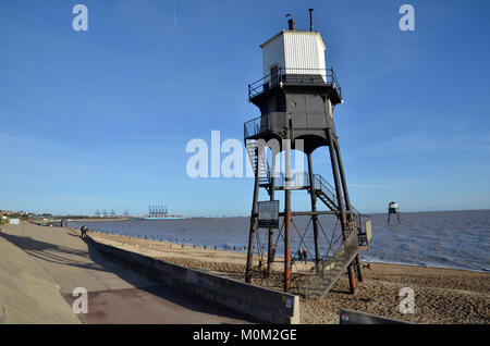 Dovercourt High and Low Lights in Harwich, Essex. The cast iron lighthouses were decommissioned in 1917 and restored between 1985-88 Stock Photo