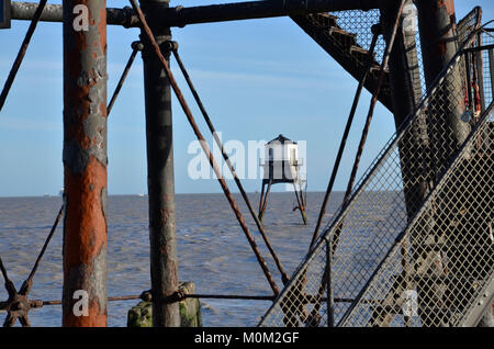 Dovercourt High and Low Lights in Harwich, Essex. The cast iron lighthouses were decommissioned in 1917 and restored between 1985-88 Stock Photo