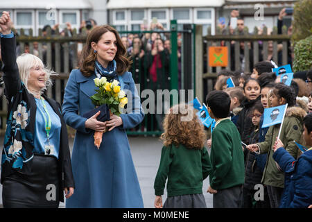 London, UK. 23rd Jan, 2018. The Duchess of Cambridge arrives to visit Roe Green Junior School to launch a new mental health project for young children as part of the Heads Together campaign. Coordinated and financed by The Royal Foundation, the project was developed by youth-focussed charity partners Heads Together, the Anna Freud National Centre for Children and Families, Place2Be and Young Minds and will be further developed with NAHT, the school leaders' association, and Centre for Mental Health. Credit: Mark Kerrison/Alamy Live News Stock Photo