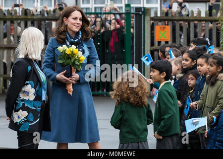 London, UK. 23rd Jan, 2018. The Duchess of Cambridge arrives to visit Roe Green Junior School to launch a new mental health project for young children as part of the Heads Together campaign. Coordinated and financed by The Royal Foundation, the project was developed by youth-focussed charity partners Heads Together, the Anna Freud National Centre for Children and Families, Place2Be and Young Minds and will be further developed with NAHT, the school leaders' association, and Centre for Mental Health. Credit: Mark Kerrison/Alamy Live News Stock Photo