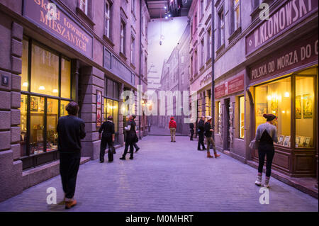 Gdansk, Poland. 23rd Jan, 2018. Visitors walk inside a exhibit room of post war streets of Poland at the World War 2 Museum.The world war 2 museum in the Polish city of Gdansk was opened on 27th of March 2017.  Credit: Omar Marques/SOPA/ZUMA Wire/Alamy Live News Stock Photo