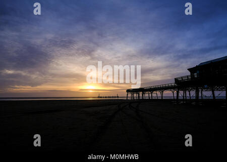 Lytham St Annes, UK. 23rd January 2018. UK Weather. After a fairly dull damp day there was a spectacukar sunset that lasted a few short minutes on the Fylde Coast in Lancashire. Credit: Paul Melling/Alamy Live News Stock Photo
