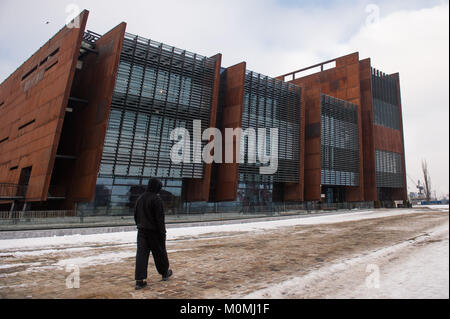 Gdansk, Poland. 23rd Jan, 2018. A man walks next to European Solidarity Centre in Gdansk. Credit: Omar Marques/SOPA/ZUMA Wire/Alamy Live News Stock Photo