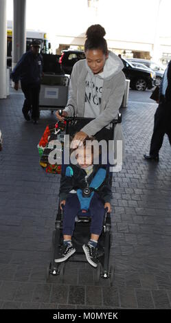 Thandie Newton and her son Booker arrive at Los Angeles International (LAX) Airport  Featuring: Thandie Newton, Booker Parker Where: Los Angeles, California, United States When: 22 Dec 2017 Credit: WENN.com Stock Photo