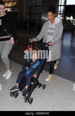 Thandie Newton and her son Booker arrive at Los Angeles International (LAX) Airport  Featuring: Thandie Newton, Booker Parker Where: Los Angeles, California, United States When: 22 Dec 2017 Credit: WENN.com Stock Photo