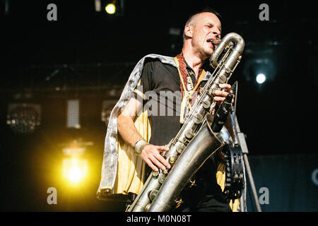 The Berlin-based international garage rock band King Khan and the Shrines performs a live concert at the Polish music festival Off Festival 2015 in Katowice. Here the saxophonist from the band is pictured live on stage. Poland, 08/08 2015. Stock Photo