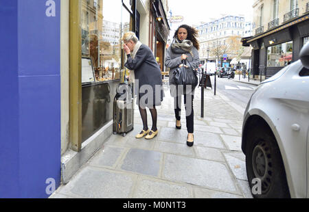 Paris, France. Older woman looking in a shop window Stock Photo