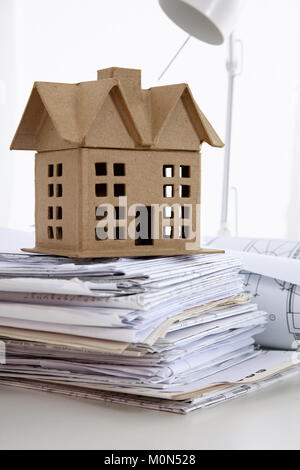 Image of new model house on architecture blueprint plan Stock Photo