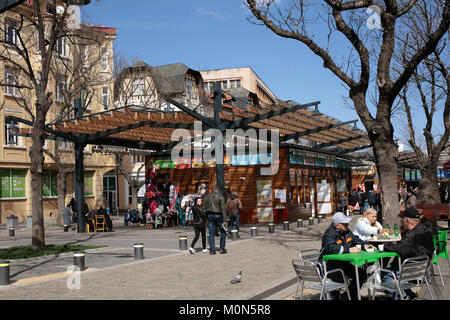 Sofia, Bulgaria - March 8, 2016: People resting and walking at the Stefan Stambolov boulevard. It is the central boulevard in the capital of Bulgaria Stock Photo