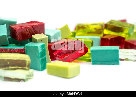 Stack of coloful glass mosaic tiles on white background Stock Photo