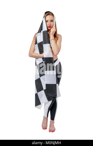 Woman is holding race checkerd flag.  Stock Photo