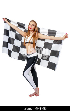 Woman is holding race checkerd flag.  Stock Photo