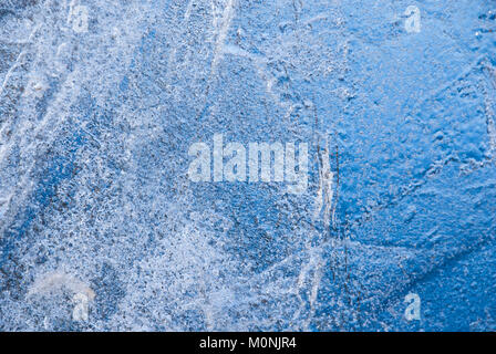 Ice sheet – close up on the natural pattern of air bubbles trapped in a sheet of ice taken from a lake in winter Stock Photo