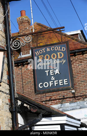 Hot and Cold Food Served Dailey and Tea and Coffee sign pictured outside a building in Selsey, West Sussex, UK. Stock Photo