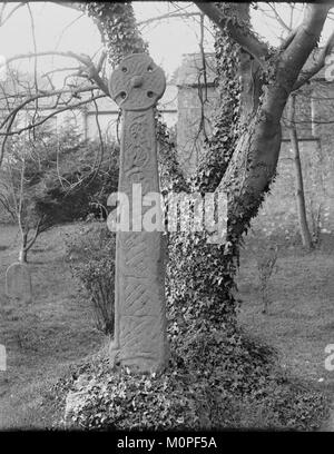 Celtic cross situated in the churchyard at St Nicholas and St Teilo's church, Penally (1293359) Stock Photo