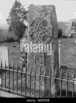 Celtic cross situated in a churchyard at Llowes (1294129) Stock Photo