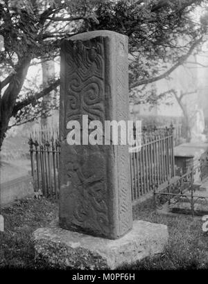 Celtic cross situated in the churchyard at St Nicholas and St Teilo's church, Penally (1294216) Stock Photo