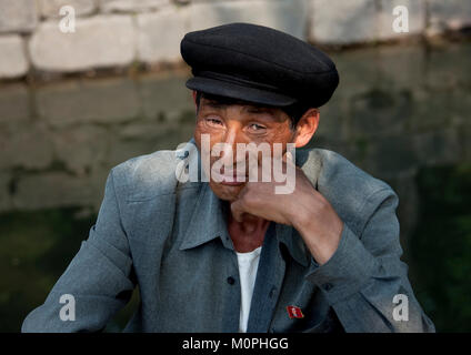 Portrait of a North Korean man with a cap, North Hwanghae Province, Kaesong, North Korea Stock Photo