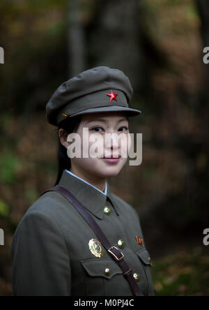 Portrait of a cute North Korean guide in military style uniform, Ryanggang Province, Chongbong, North Korea Stock Photo