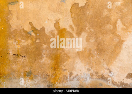 stained plastered beige wall for backgrounds Stock Photo