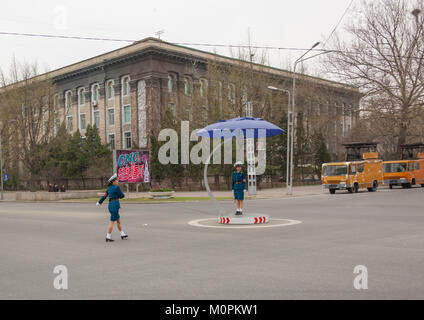 North Korean female traffic security officers in blue uniforms, Pyongan Province, Pyongyang, North Korea Stock Photo