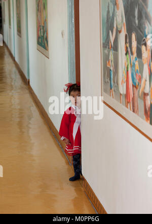 Shy North Korean girl in an orphanage, South Pyongan Province, Nampo, North Korea Stock Photo