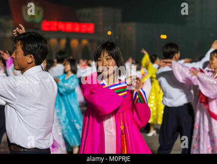 North Korean students dancing to celebrate april 15 the birth anniversary of Kim Il-sung, Pyongan Province, Pyongyang, North Korea Stock Photo