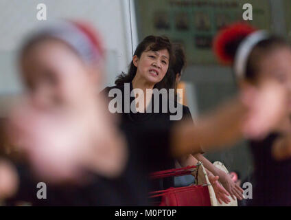 Dance teacher in Mangyongdae children's palace, Pyongan Province, Pyongyang, North Korea Stock Photo