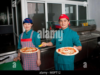 North Korean cooks in a pizzeria, Pyongan Province, Pyongyang, North Korea Stock Photo