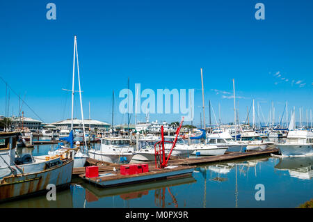 MOSS LANDING, CALIFORNIA - SEPTEMBER 9, 2015 - Boats docked in the Moss Landing Harbor. Moss Landing is located on the shore of Monterey Bay Stock Photo