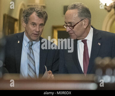 Washington, District of Columbia, USA. 23rd Jan, 2018. United States Senate Majority Leader Chuck Schumer (Democrat of New York), right, US Senator Sherrod Brown (Democrat of Ohio), left, speak prior to making remarks following the Democratic Party policy luncheon in the US Capitol in Washington, DC on Tuesday, January 23, 2018.Credit: Ron Sachs/CNP Credit: Ron Sachs/CNP/ZUMA Wire/Alamy Live News Stock Photo