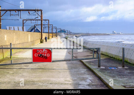 Saltcoats, Scotland, UK. 24th January  2018. UK Weather: Strong winds hit Ayrshire coast causing waves to crash against the sea wall. The road is closed for safety reasons. Storm Georgina is the seventh named storm of the season and is forecast to bring high wind and rain sweeping easterly across Britain. Credit: Skully/Alamy Live News Stock Photo