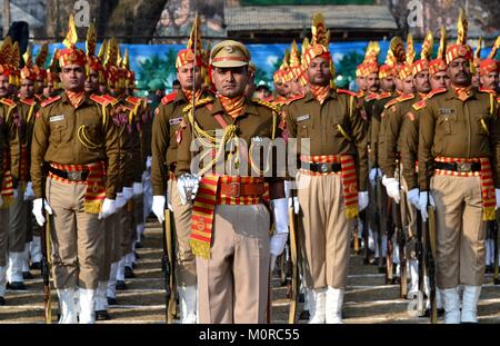 Srinagar, India. 24th Jan, 2018. Indian policemen take part in the rehearsal for the upcoming Indian Republic Day parade in Srinagar, Indian administered Kashmir. Full dress rehearsal of the parade was held at the Sher''“e''“Kashmir stadium today. Security was extra ordinarily tight in the city to thwart possible strikes by anti- India rebels on the occasion of India's 69th Republic Day. Credit: Saqib Majeed/SOPA/ZUMA Wire/Alamy Live News Stock Photo