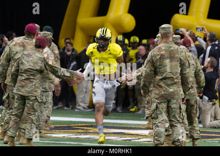 Jaiden Woodbey, an athlete from St. John Boscoe High School in Bellflower, Calif., runs out onto the field during the pre-game events at the U.S. Army All-American Bowl Jan. 6, 2018, in San Antonio, Texas. The All-American Bowl is the nation’s premier high school football game, serving as the preeminent launching pad for America’s future college and National Football League stars. (U.S. Army Stock Photo