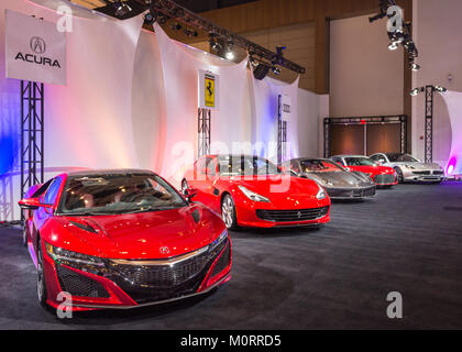 DETROIT, MI/USA - JANUARY 15, 2018: An Acura NSX, Ferrari, and Audi cars at the North American International Auto Show (NAIAS). Stock Photo