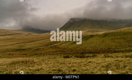 Dark clouds over Picws Du (Bannau Sir Gaer) in the Carmarthen Fans, Carmarthenshire, Wales, UK Stock Photo