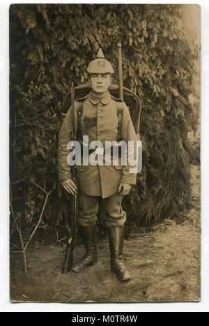 Germany. WW1 soldier in full uniform with rifle and helmet Stock Photo ...