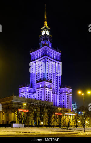 Warsaw, Masovia / Poland - 2018/01/24: colorful night illumination of Culture and Science Palace by Defilad Square in Warsaw city center Stock Photo