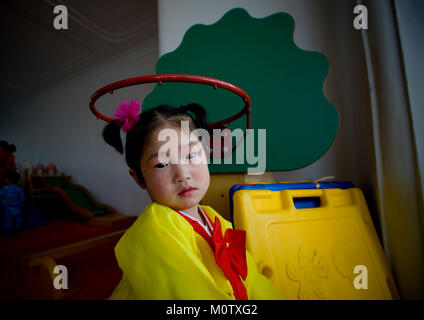 North Korean girl dressed in choson-ot in an orphanage, South Pyongan Province, Nampo, North Korea Stock Photo