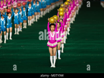 North Korean children performing with balloons during the Arirang mass games in may day stadium, Pyongan Province, Pyongyang, North Korea Stock Photo