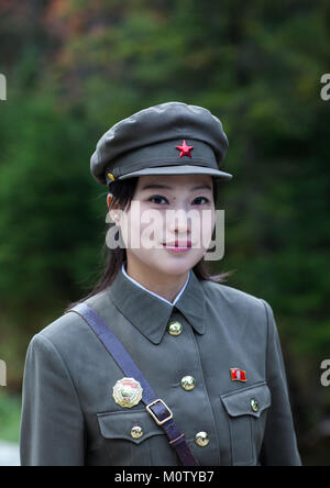 Portrait of a cute North Korean guide in military style uniform, Ryanggang Province, Chongbong, North Korea Stock Photo