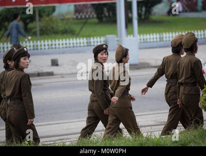 North Korean women soldiers walking in the countryside, North Hwanghae ...